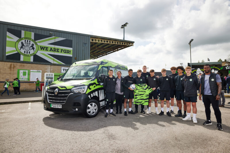 Forest Green Rovers’ Youth Team are stood outside in front of the club's new 100% electric Renault Trucks Master E-Tech minibus.