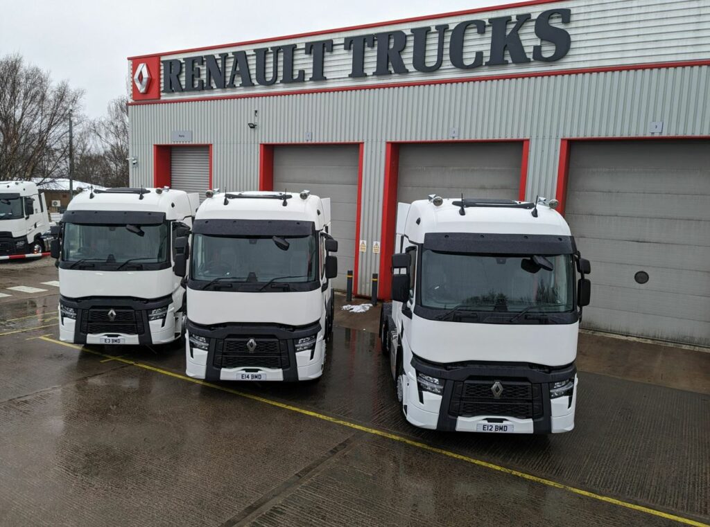 three white Renault Trucks T Ranges outside RH Commercial Vehicles.